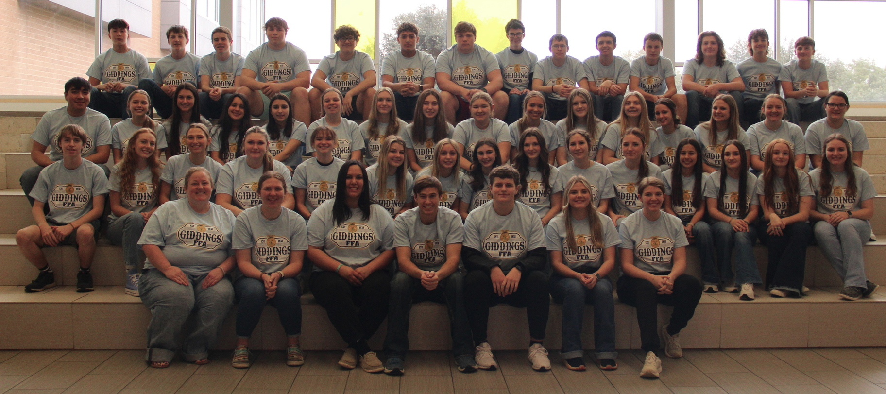Een groep sportieve studenten van de Giddings High School.