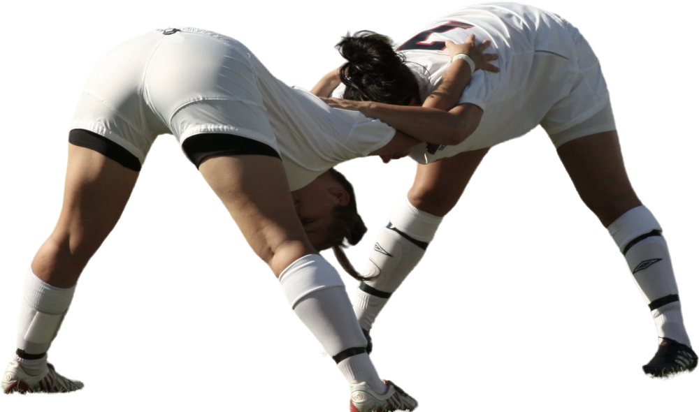 Twee voetbalsters doen strekoefeningen.